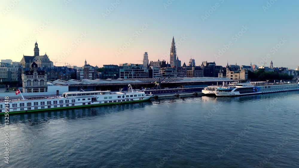 Antwerp north sea with boats docked along the river, city skyline, aerial view Antwerp north sea with boats docked along the river, city skyline, aerial view