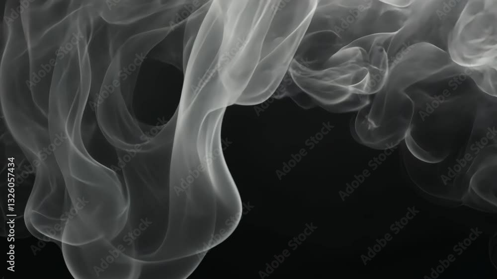 Ethereal dance of white smoke on dark background in slow motion Ethereal dance of white smoke on dark background in slow motion