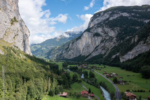 Stunning Aerial View of Lauterbrunnen Valley, Switzerland – Alpine River Flowing Through a Picturesque Mountain Landscape
