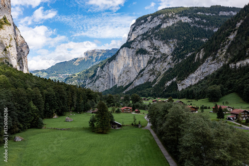 Stunning Aerial View of Lauterbrunnen Valley, Switzerland – Alpine River Flowing Through a Picturesque Mountain Landscape
