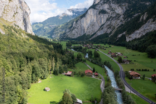 Stunning Aerial View of Lauterbrunnen Valley, Switzerland – Alpine River Flowing Through a Picturesque Mountain Landscape