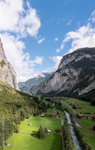 Stunning Aerial View of Lauterbrunnen Valley, Switzerland – Alpine River Flowing Through a Picturesque Mountain Landscape