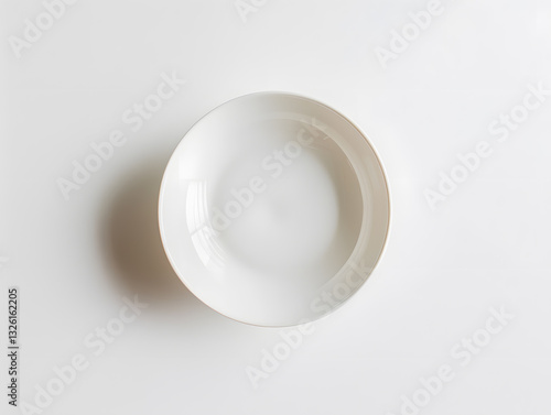 Product photography of minimalist white porcelain plates