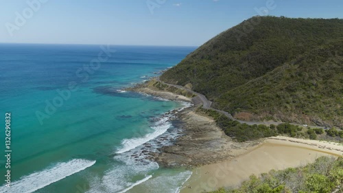 Wallpaper Mural A stunning aerial view of the Great Ocean Road, showcasing dramatic cliffs, the ocean, and lush landscapes from a high vantage point. Torontodigital.ca