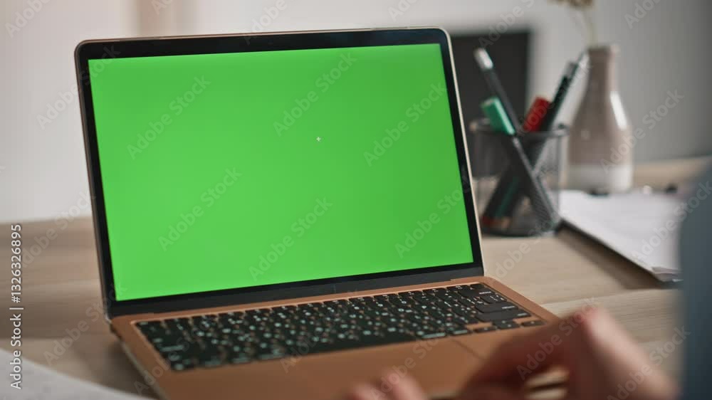 Businesswoman using mockup laptop for remote work at home workplace closeup. Businesswoman using mockup laptop for remote work at home workplace closeup.