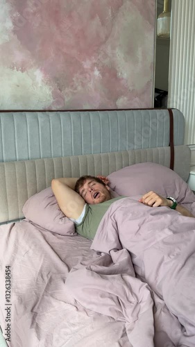 man has trouble breathing during sleep, snoring