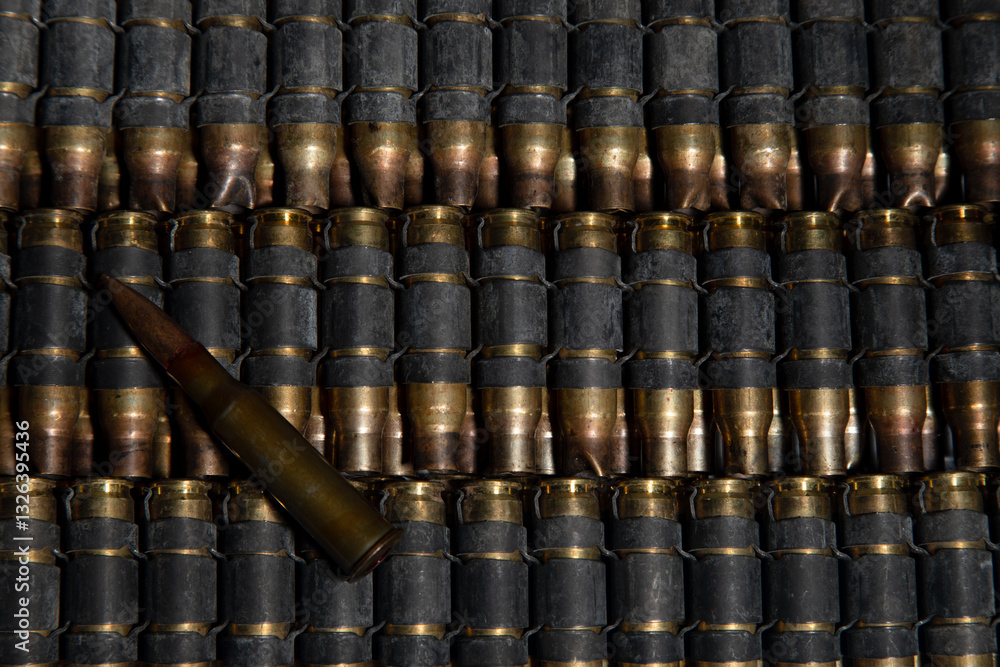 Background of cartridges from balls lying in a row. Weapons delivery concept Background of cartridges from balls lying in a row. Weapons delivery concept