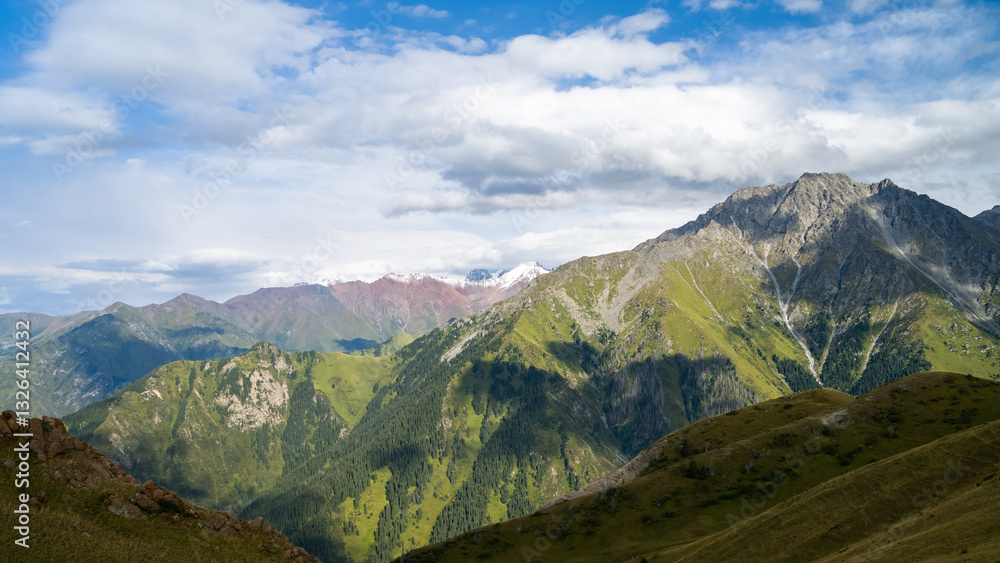 Obraz premium rocky mountain peaks in the clouds. cloud cover in the mountains