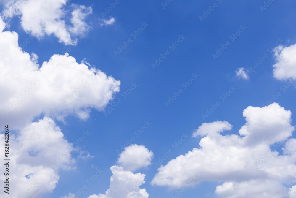Bright Blue Sky with Scattered White Clouds, Nature Backdrop
Bright Blue Sky with Scattered White Clouds, Nature Backdrop