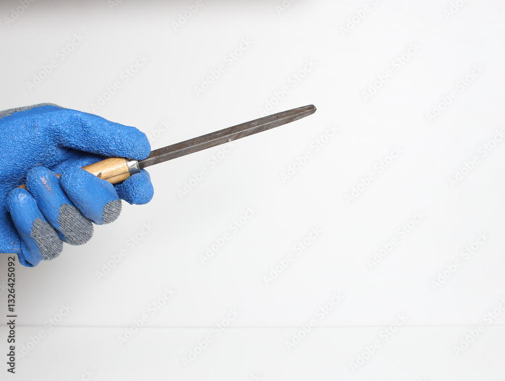 Fototapeta premium file in the hand in a blue glove