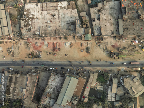 Aerial view of urban development with construction sites and city traffic, Duptara, Araihazar, Dhaka, Bangladesh. photo