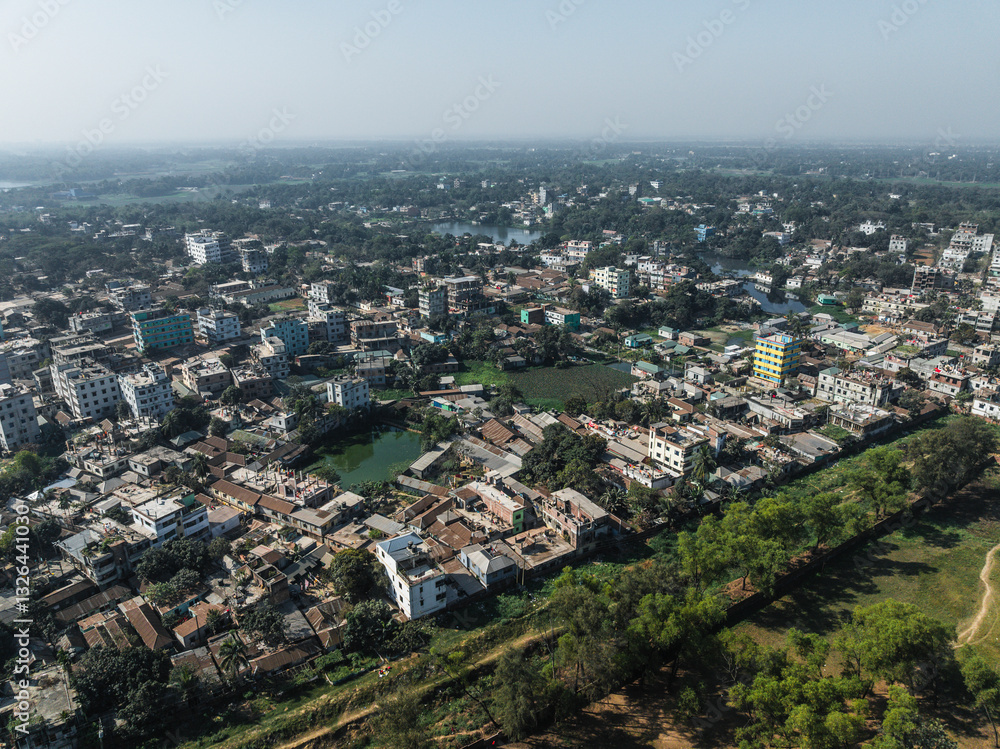 Aerial view of a dense urban landscape with buildings, trees, and roads, Pathalia, Savar, Dhaka, Bangladesh. Aerial view of a dense urban landscape with buildings, trees, and roads, Pathalia, Savar, Dhaka, Bangladesh.