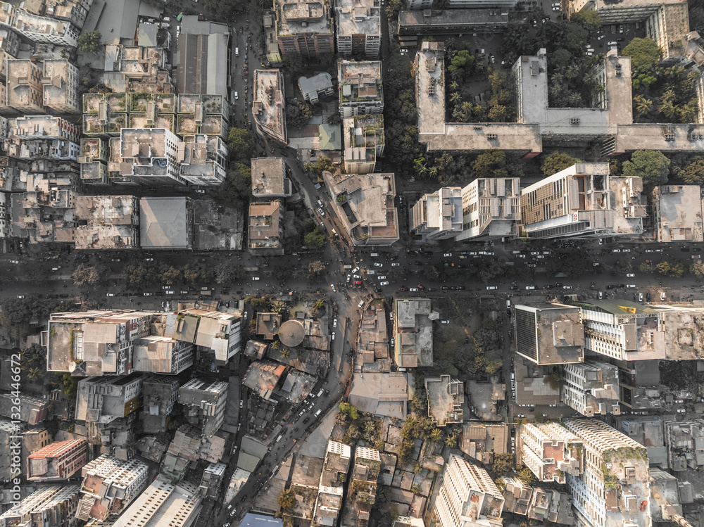 Aerial view of bustling cityscape with crowded streets and modern architecture, Shahbag, Dhaka, Bangladesh. Aerial view of bustling cityscape with crowded streets and modern architecture, Shahbag, Dhaka, Bangladesh.