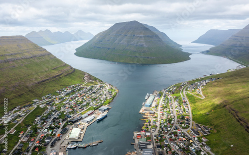 Aerial view of picturesque Klaksvik with serene fjords, majestic mountains, and beautiful coastline, Biskupsstod, Nordoyar, Faroe Islands. photo