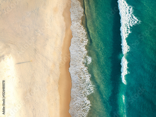 Aerial view of beautiful beach with clear blue water and calming waves, Port Noarlunga, South Australia, Australia. photo