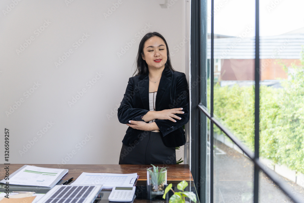 Portrait of confident asian professional business woman executive manager successful standing in office Portrait of confident asian professional business woman executive manager successful standing in office
