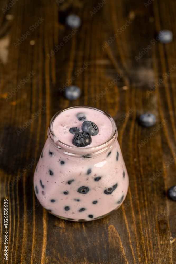 blueberry yogurt with slices and whole berries blueberry yogurt with slices and whole berries