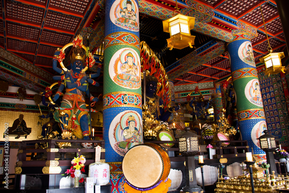 Obraz premium Fudo Myoo statue or Acala in Daitou or Great Peace Pagoda for japanese people visit and praying of Naritasan Shinshoji Temple at Chiba city in Tokyo, Japan