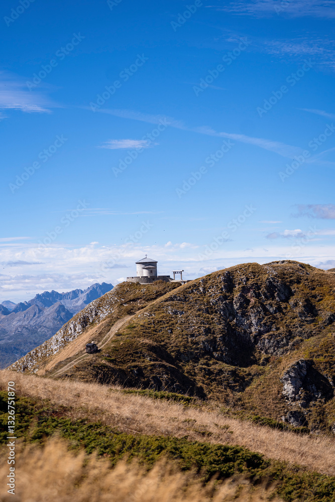 Fototapeta premium mountain church with offroad cars