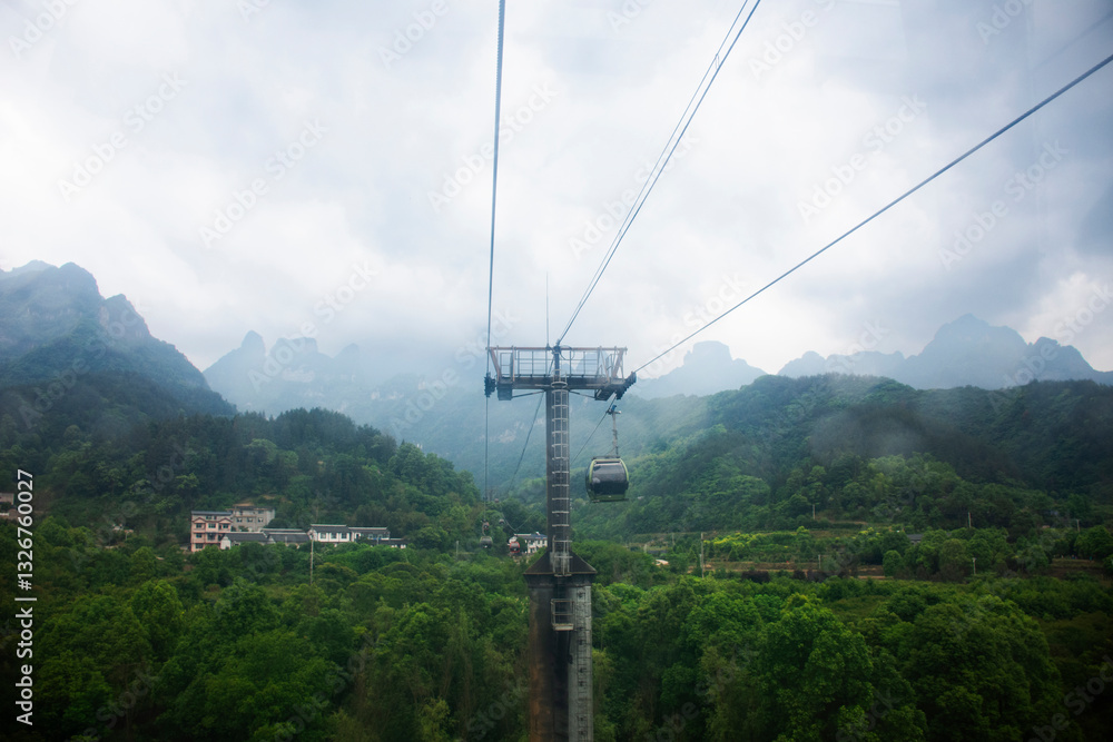 View landscape mountain and cable car cableway for chinese people foreign traveler travel visit Tianmen Shan cave or Heaven Gate in Tianmen Mountain National Forest Park at Zhangjiajie in Hunan China View landscape mountain and cable car cableway for chinese people foreign traveler travel visit Tianmen Shan cave or Heaven Gate in Tianmen Mountain National Forest Park at Zhangjiajie in Hunan China