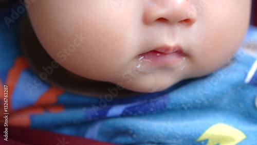 Photos profuse salivation in infants from the mouth