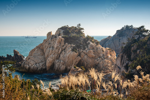 Cliffs and islands of the Korean coast line with a view towards the sea horizon