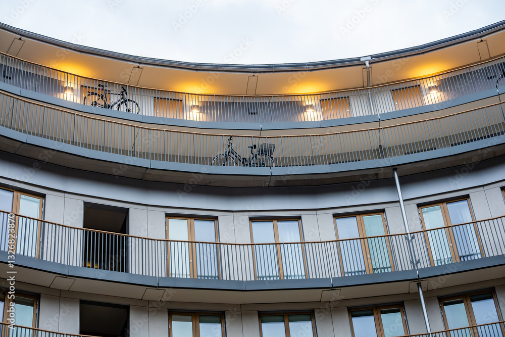 Fototapeta premium Stockholm, Sweden A bicycle parked on a balcony in the Plankan urban development building in the Sodermalm district.