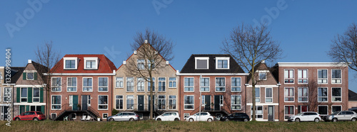 Modern colorful residential buildings along the water in the Vathorst district in Amersfoort.