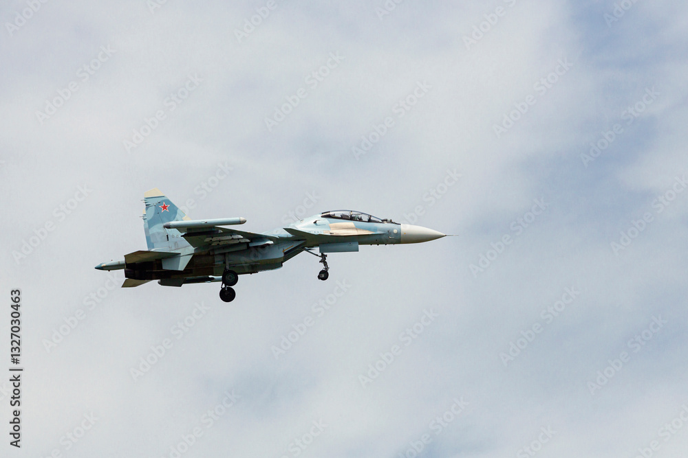Obraz premium A modern Russian strike fighter flying in the sky. Military aircraft of the Russian Air Force