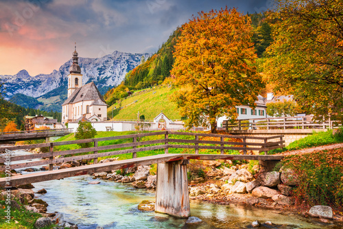 Obraz na płótnie Ramsau am Berchtesgaden, Germany. Autum colored landscape of Saint Sebastian Church and River Ramsauer Ache, Bayern. w salonie