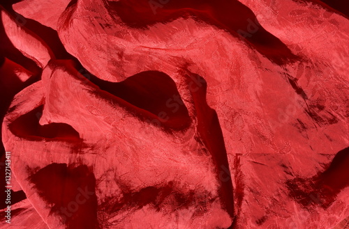 Abstract of crimson red silk background.
