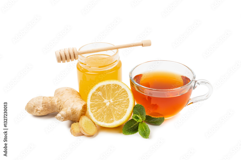 Cup of hot ginger tea with slices of ginger root isolated on white background. Warming drink. Alternative medicine. Tea with honey, lemon, ginger and mint. Space for text. Copy space Cup of hot ginger tea with slices of ginger root isolated on white background. Warming drink. Alternative medicine. Tea with honey, lemon, ginger and mint. Space for text. Copy space