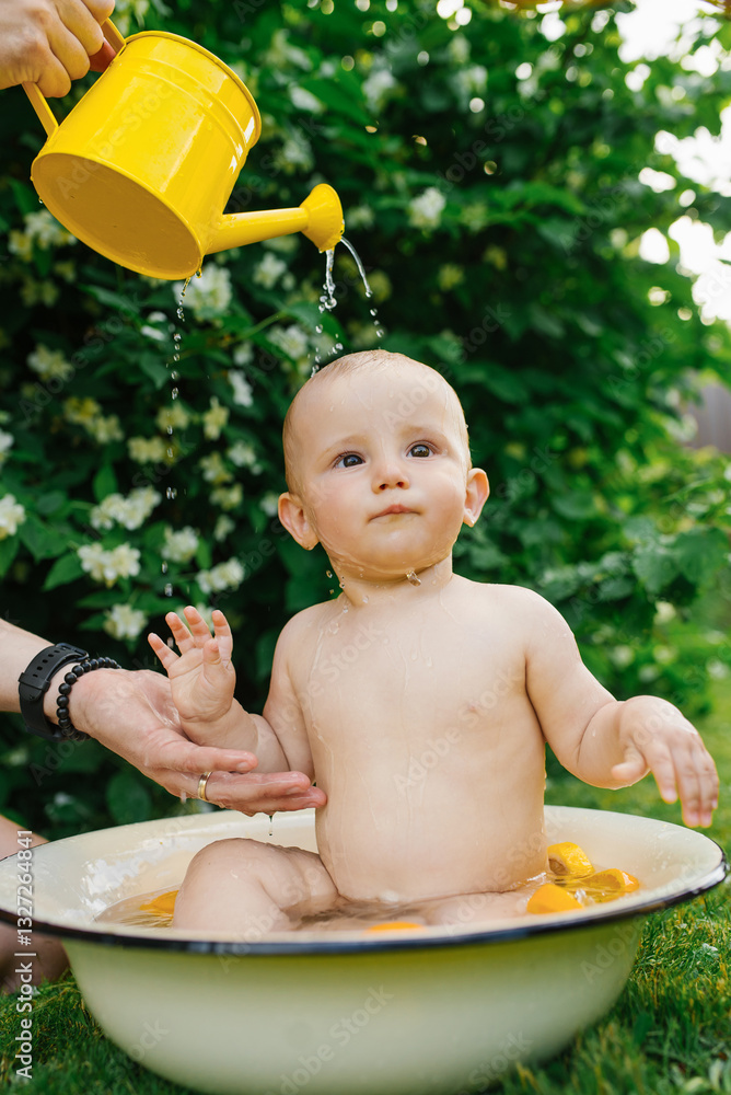 Baby With Water Pouring From Watering Can