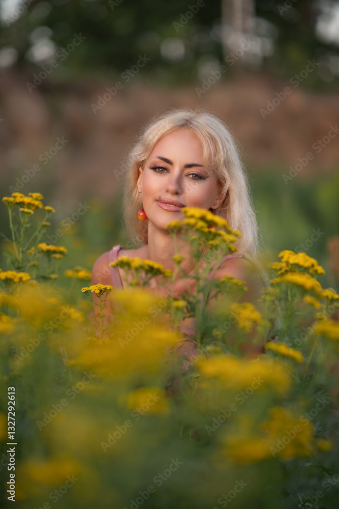 Portrait of a young beautiful blonde girl in nature. Portrait of a young beautiful blonde girl in nature.