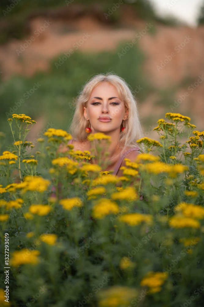 Portrait of a young beautiful blonde girl in nature. Portrait of a young beautiful blonde girl in nature.