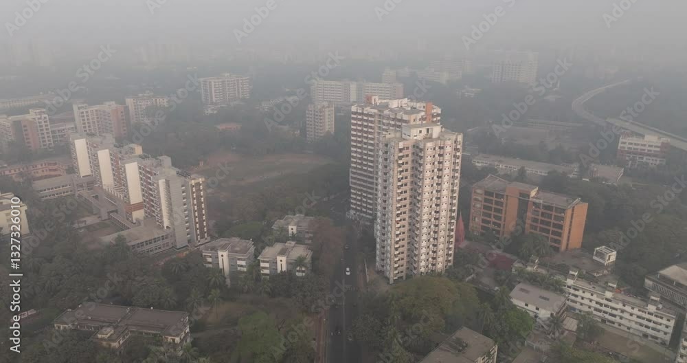 Aerial view of a bustling urban skyline with high-rise buildings and smog, Dhaka, Dhaka Province, Bangladesh. Aerial view of a bustling urban skyline with high-rise buildings and smog, Dhaka, Dhaka Province, Bangladesh.