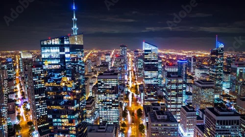 Nighttime City Skyline with Illuminated Skyscrapers and Lights Stock Video 4K Ultra Full HD Stock Video Footage Download