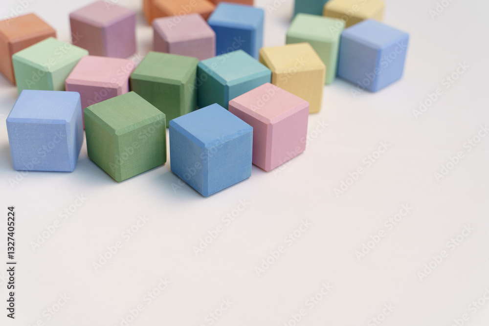 colorful wooden toy cubes background with copy space colorful wooden toy cubes background with copy space