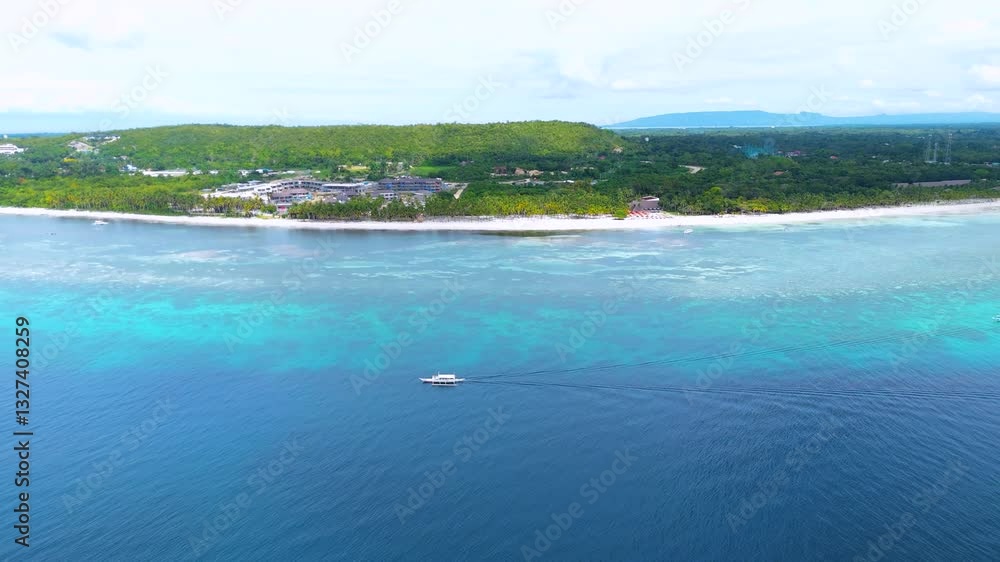 Aerial drone view of fishing boat in ocean on the island of Bohol, Philippines Aerial drone view of fishing boat in ocean on the island of Bohol, Philippines