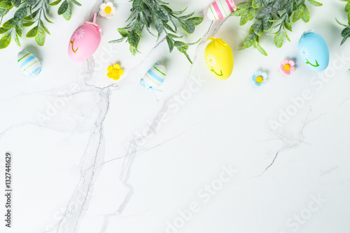 Obraz na płótnie Easter composition with colored eggs and green plants on white background. w salonie