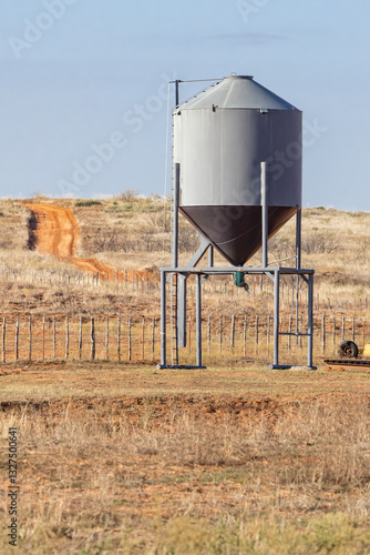 Obraz na płótnie Grain hopper along a farm road in Texas. w salonie