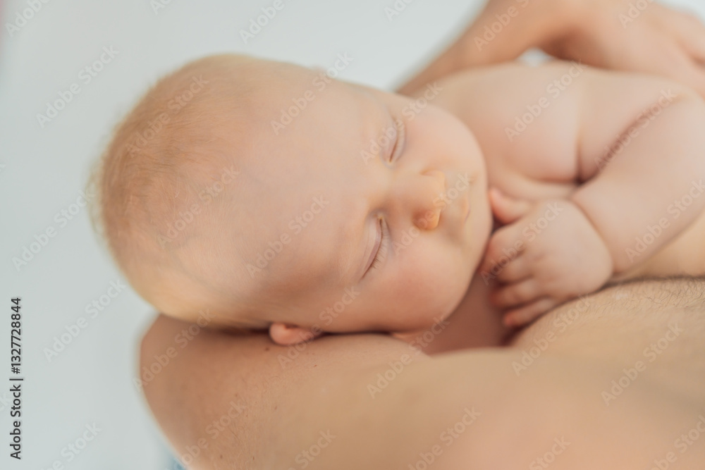 A baby peacefully falls asleep in his father's arms, skin-to-skin. A heartwarming and intimate moment of love, bonding, and parenthood, showcasing the deep connection between father and child A baby peacefully falls asleep in his father's arms, skin-to-skin. A heartwarming and intimate moment of love, bonding, and parenthood, showcasing the deep connection between father and child