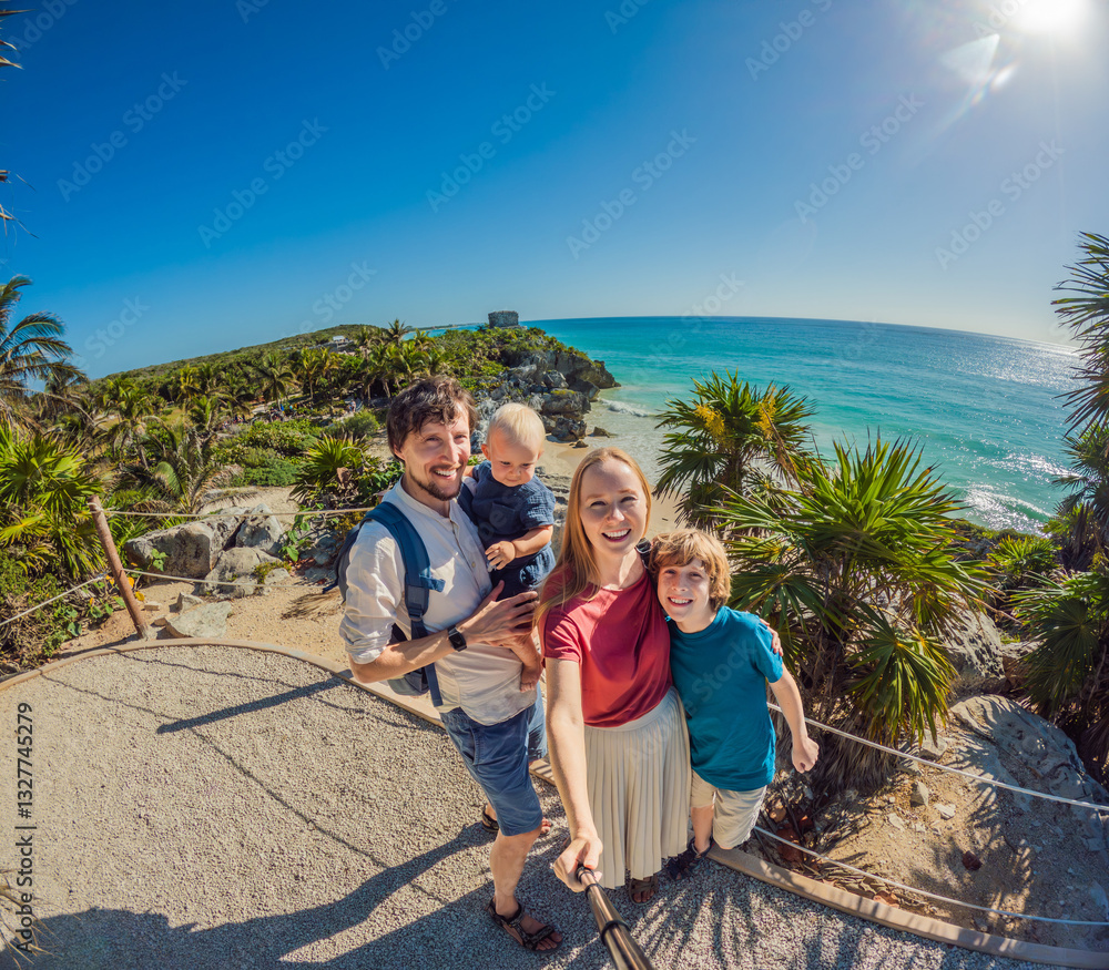 Family of four tourists, mother, father, and two sons, posing in front of a majestic Mayan pyramid in Tulum. Perfect for cultural exploration, family travel, and discovering ancient history. Travel