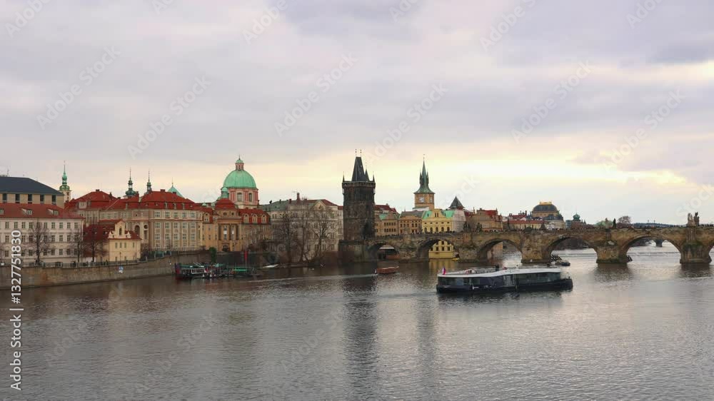 Charles Bridge and Vltava River with Tourist Boat in Prague Charles Bridge and Vltava River with Tourist Boat in Prague