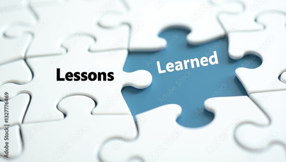 Text on a Jigsaw Puzzle background featuring the words Lessons learned. Text on a Jigsaw Puzzle background featuring the words Lessons learned.