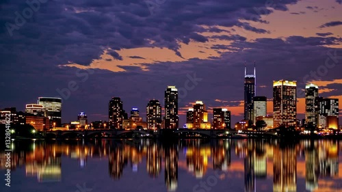 Wallpaper Mural Vibrant city skyline reflections at twilight with dramatic cloudscape overhead Torontodigital.ca