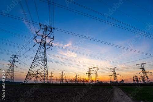 The pylons are in the evening, Substation in the evening, High voltage substation and beautiful sunset glow