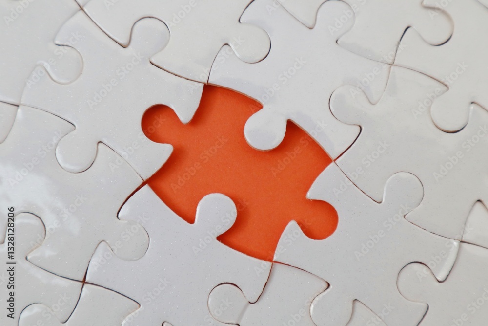 Incomplete white puzzles with an orange background Incomplete white puzzles with an orange background