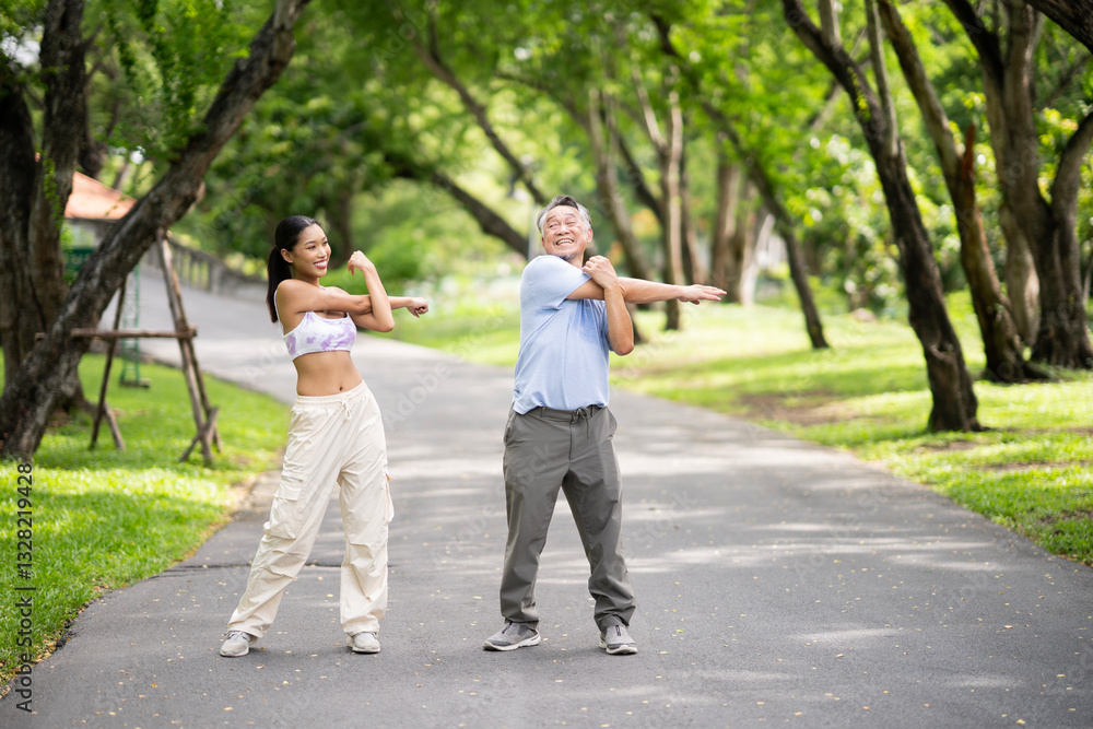 Happy oldery Asian man enjoy exercise with fresh air and nature with daughter. Senior man and a girl workout at park. Healthy retirement and life insurance concept. Happy oldery Asian man enjoy exercise with fresh air and nature with daughter. Senior man and a girl workout at park. Healthy retirement and life insurance concept.