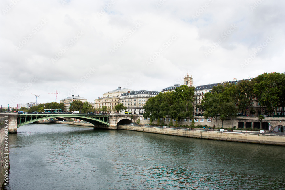 Naklejka premium View landscape of Paris city at riverside of Seine river and Prefecture de Police and Theatre de la Villewith traffic road